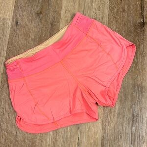 Lululemon neon orange/pink shorts